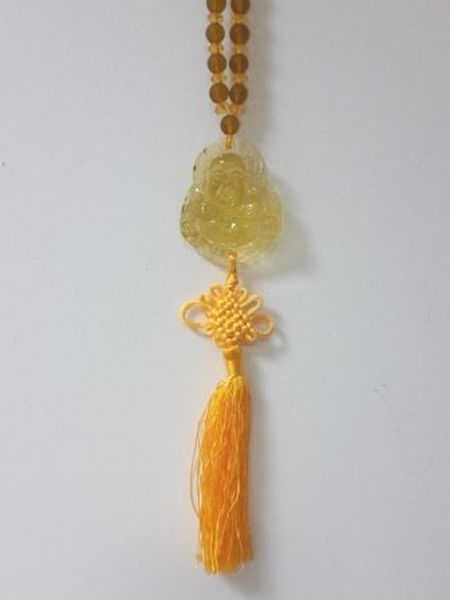 Imagen de Colgante Feng Shui Budha amarillo transparente