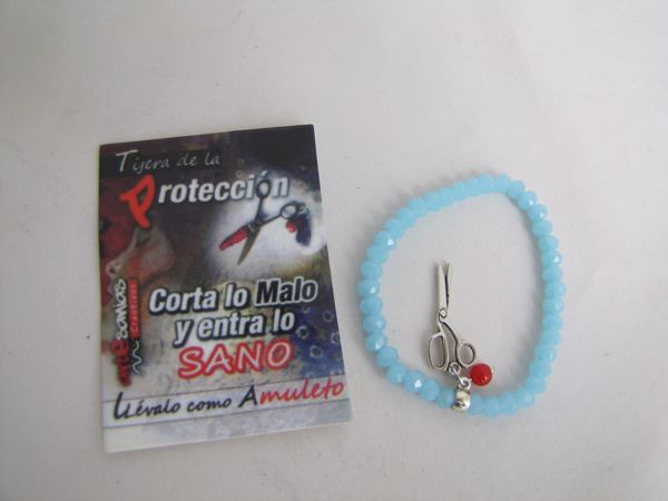 Imagen de PULSERA TIJERA PROTECCION CRISTAL FACETADO AZUL CLARO