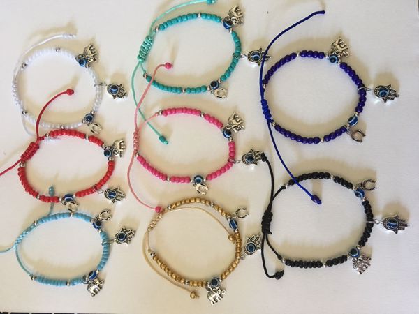 Imagen de PULSERA OJO TURCO CON HERRADURA, MANO DE FATIMA Y ELEFANTE EXTENSIBLES (PACK 8 COLORES VARIADOS)