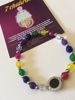 Imagen de PULSERA 7 CHAKRAS PIEDRAS  FACETADAS CON RELOJ EN ACERO Y ONIX. MODELOS EXCLUSIVOS