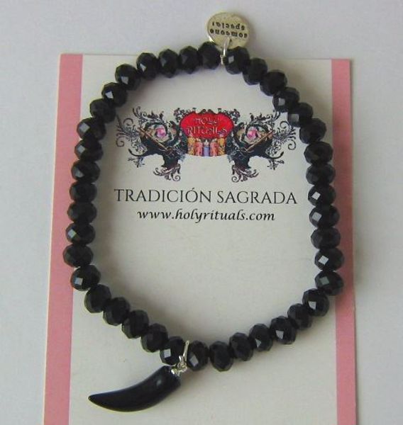 Imagen de PULSERA CRISTAL FACETADO NEGRA COLMILLO DE SABLE Y MEDALLA