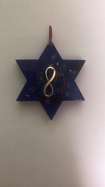 Imagen de COLGANTE ORGONITA ESTRELLA INFINITO AZUL 5X6 CMS