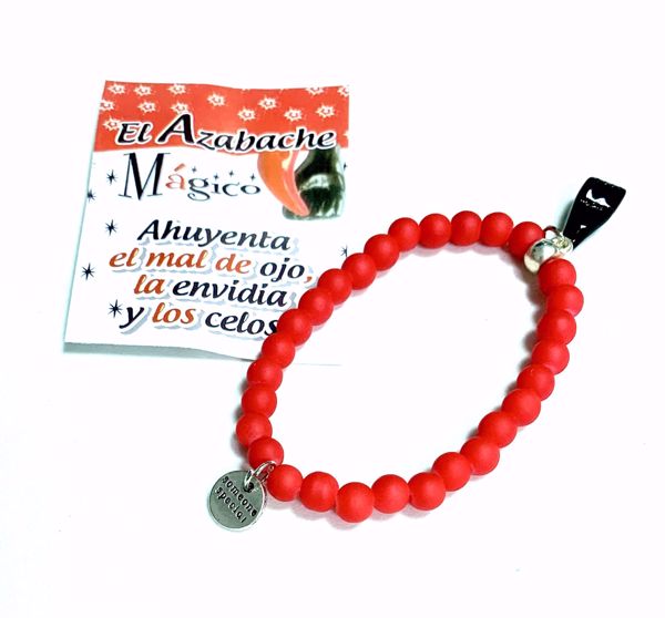 Imagen de Pulsera mano higa negra. Bolas de caucho roja. Puño cerrado.