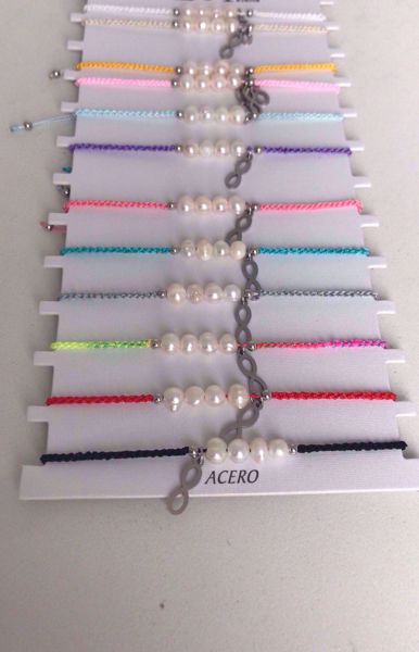 Imagen de PULSERA CUERDA INFINITO ACERO AZUL CLARO